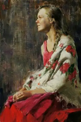 花柄のショールを持つエレガントな若い女性